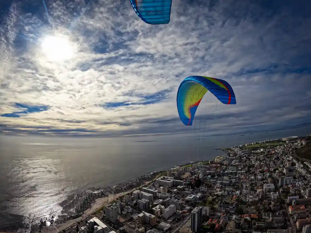 A rainbow canopy over the city and the bay
