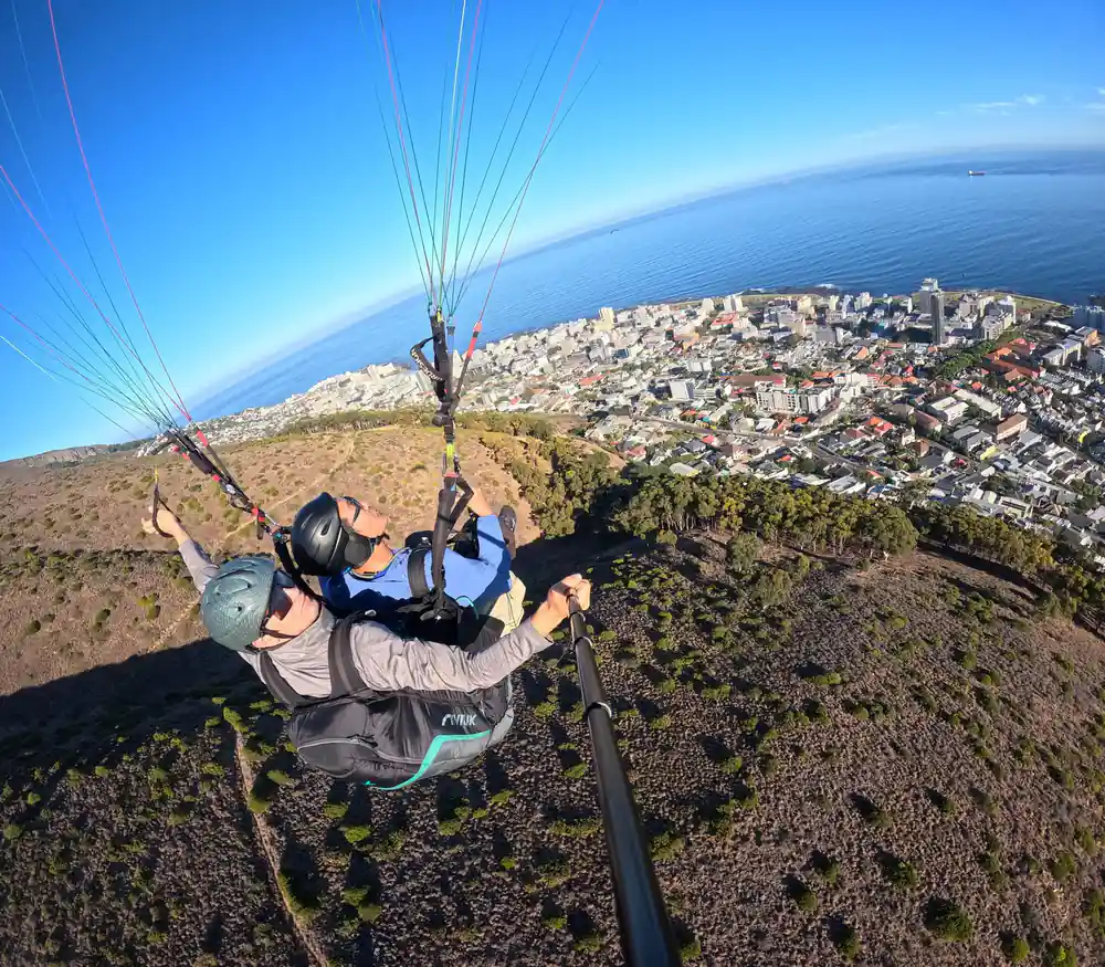 A tandem above the scrub of the hillside